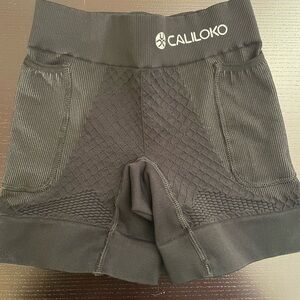 Caliloko Compression shorts, Women's size 1, side pockets, NWOT
